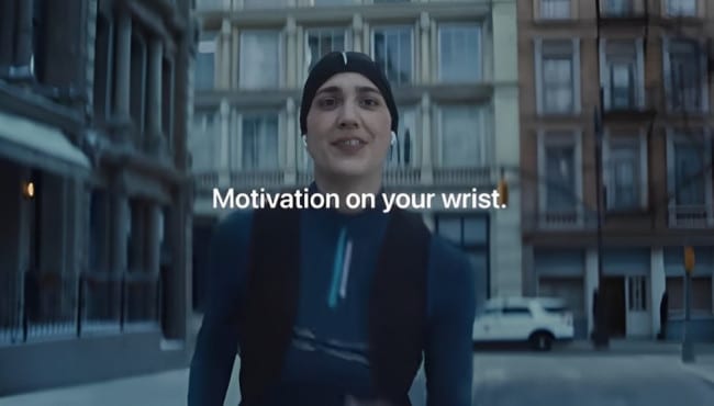 Runner wearing an Apple Watch with the text &ldquo;Motivation on your wrist.&rdquo;