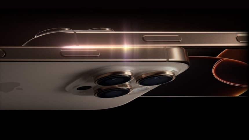 Close-up of an iPhone with triple cameras and a glowing metallic edge.