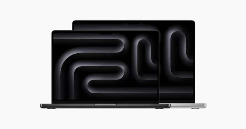 Two MacBook Pro laptops with dark screens.