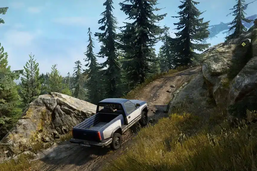 Off-road truck driving through a forest trail in SnowRunner.