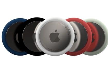 Apple AirTag trackers in multiple colours displayed side by side.
