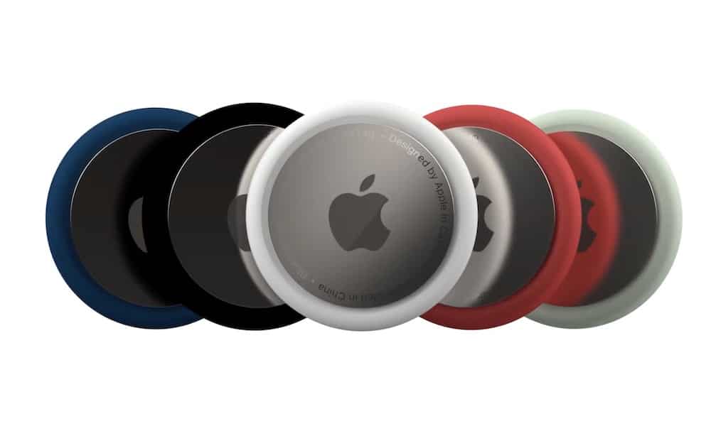 Apple AirTag trackers in multiple colours displayed side by side.