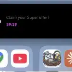 Duolingo promotional message displayed in the iPhone Dynamic Island interface.