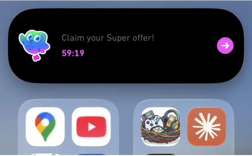 Duolingo promotional message displayed in the iPhone Dynamic Island interface.