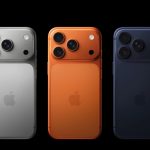 Three iPhones shown from the back in silver, orange, and dark blue.