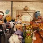 Muppet characters wearing 3D glasses posing for Muppet*Vision 3D promotion.
