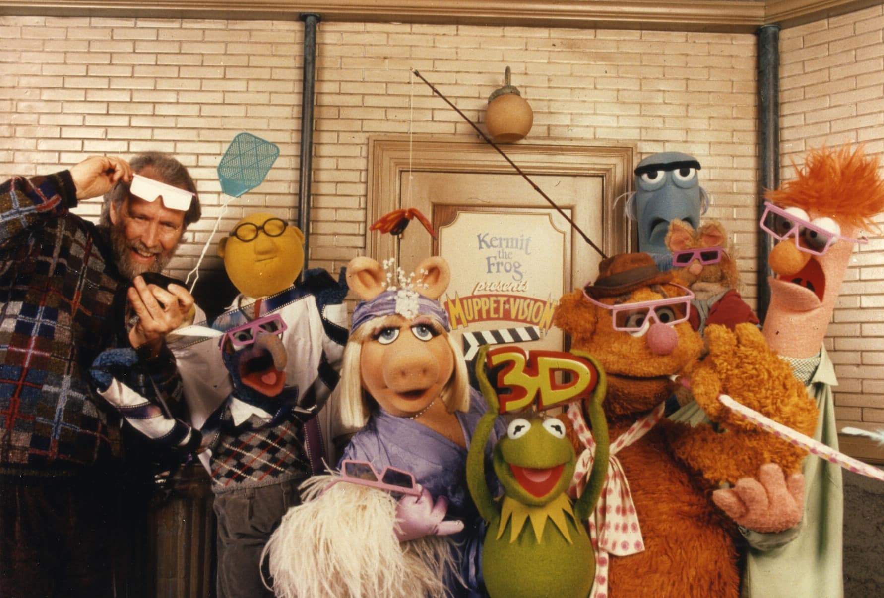 Muppet characters wearing 3D glasses posing for Muppet*Vision 3D promotion.