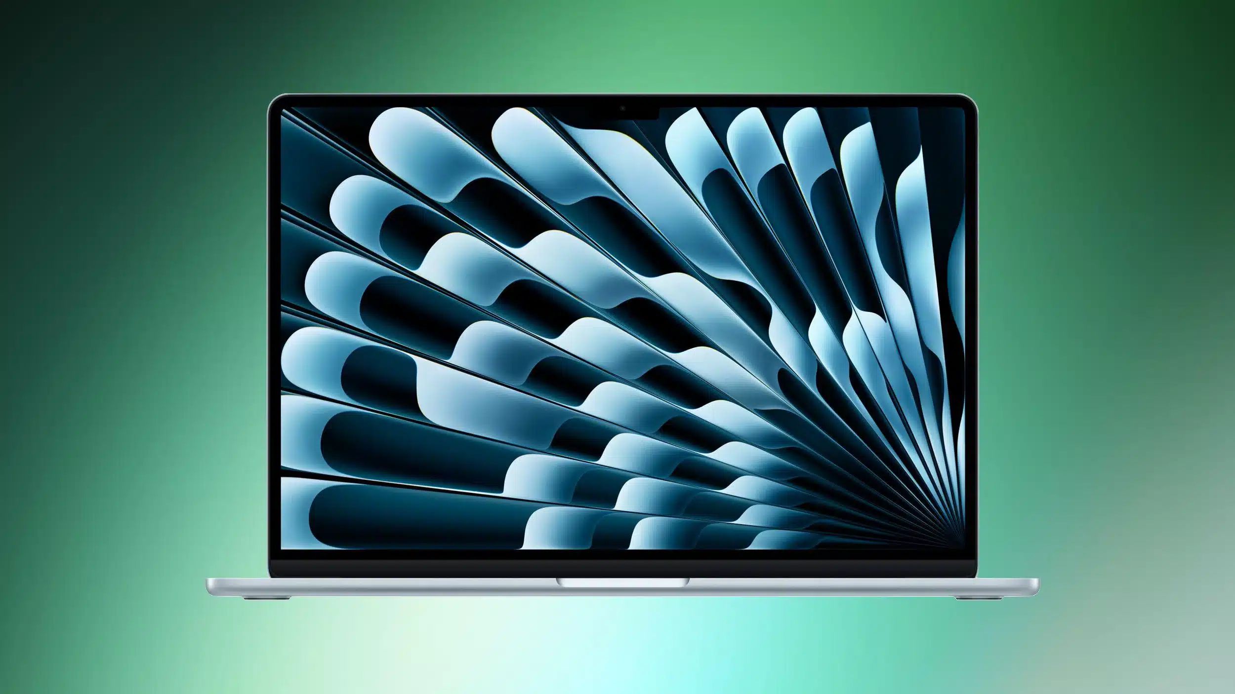 MacBook Air with vibrant OLED-style display on green background.