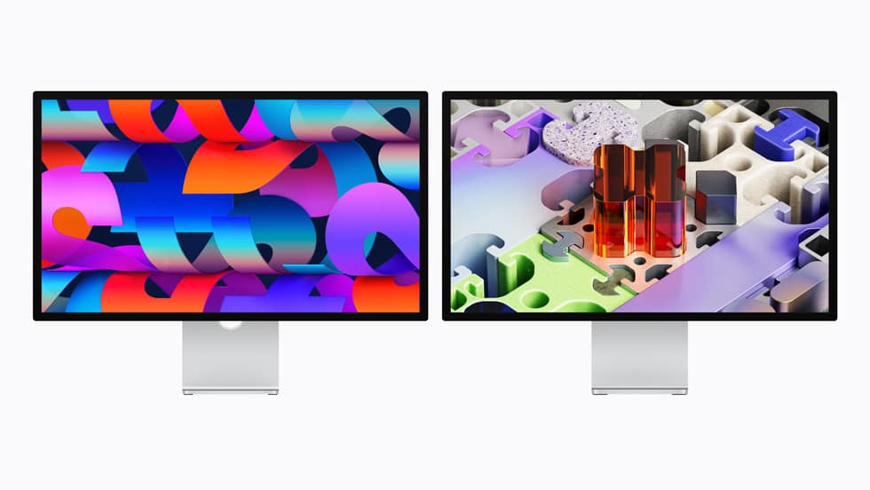 Two Apple Studio Display XDR monitors showing colourful abstract designs
