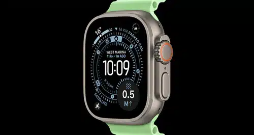 Apple Watch Ultra with green band and digital display.