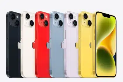 Colourful lineup of Apple iPhones displayed in multiple finishes.