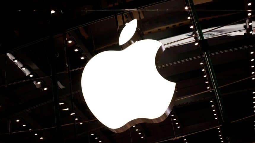 Apple logo inside a retail store ceiling.