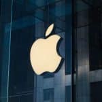 Apple logo on a glass building exterior