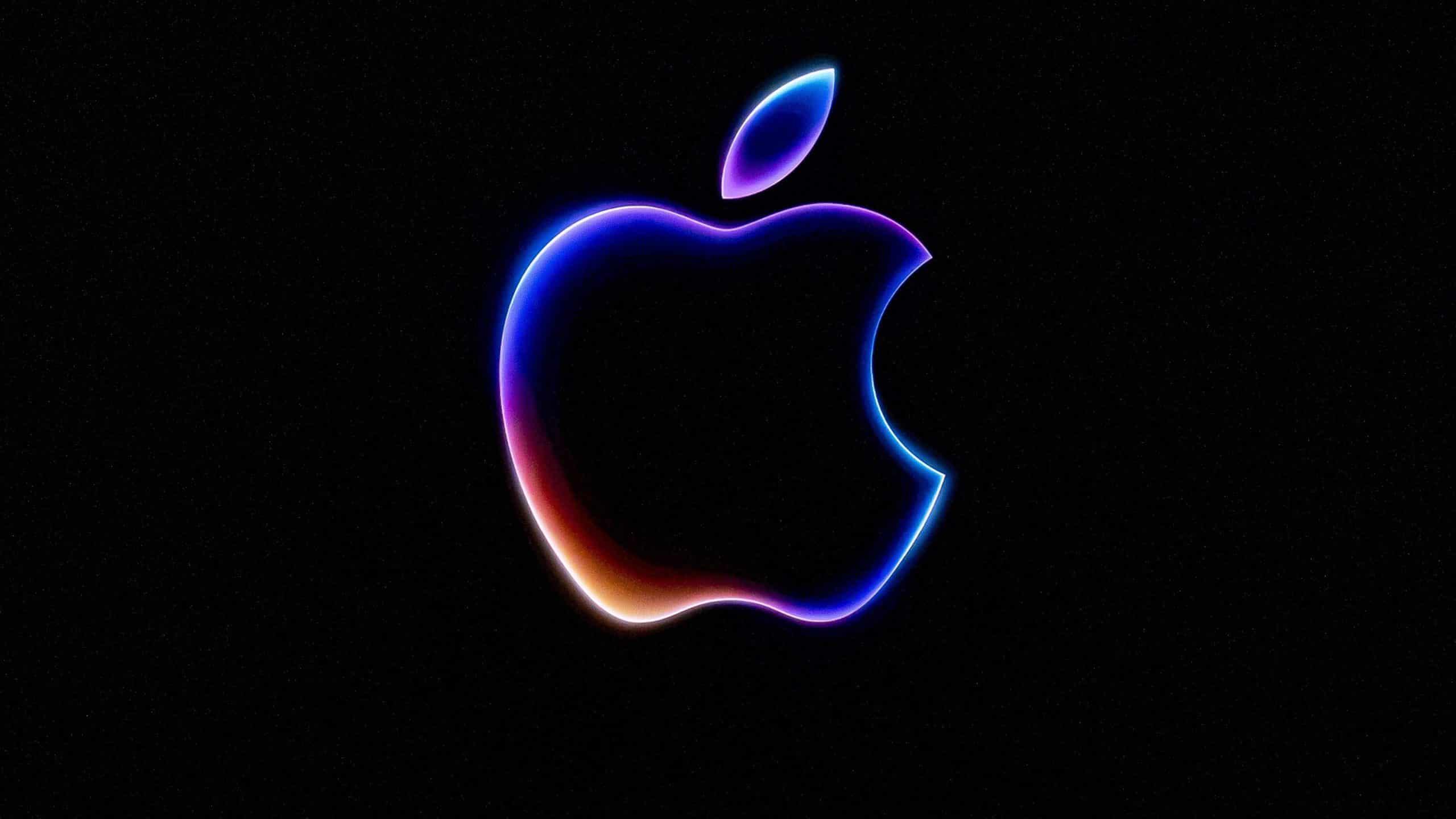 Glowing Apple logo on a dark background.