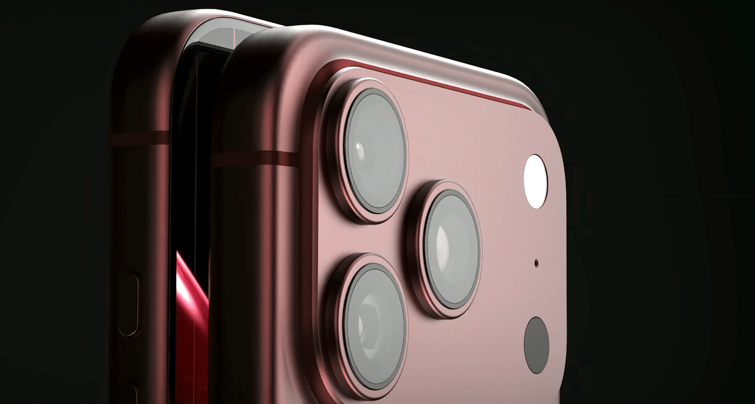 Close-up of a red iPhone with triple camera lenses.