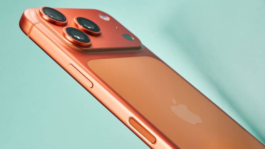 Orange iPhone with triple camera setup shown from the back.