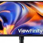 Samsung ViewFinity S8 monitor displaying a colourful abstract image on screen.