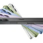 Stack of iPhones in multiple colours displayed in a fan arrangement.