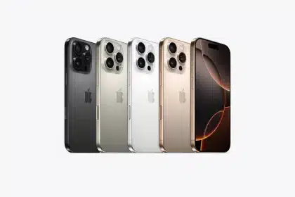 Four iPhone 16 Pro models displayed in different colours alongside a front-facing iPhone.