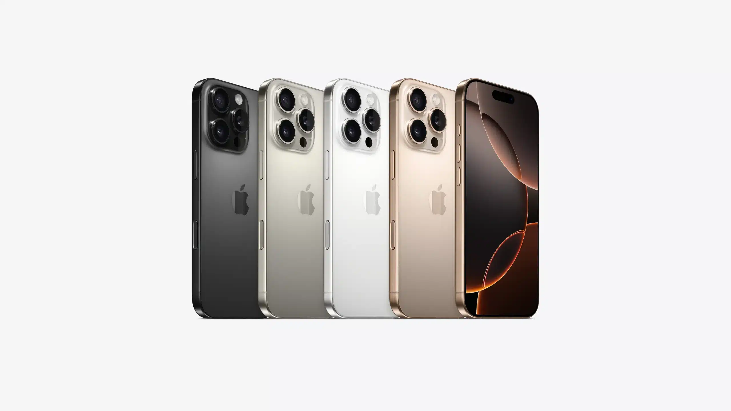 Four iPhone 16 Pro models displayed in different colours alongside a front-facing iPhone.