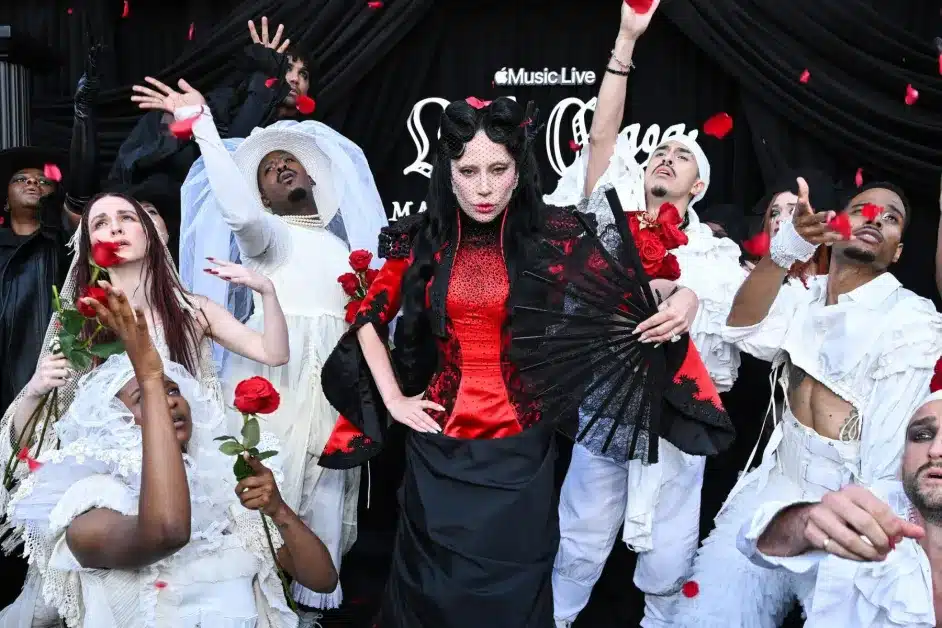 Lady Gaga performing with dancers during Apple Music Live event.