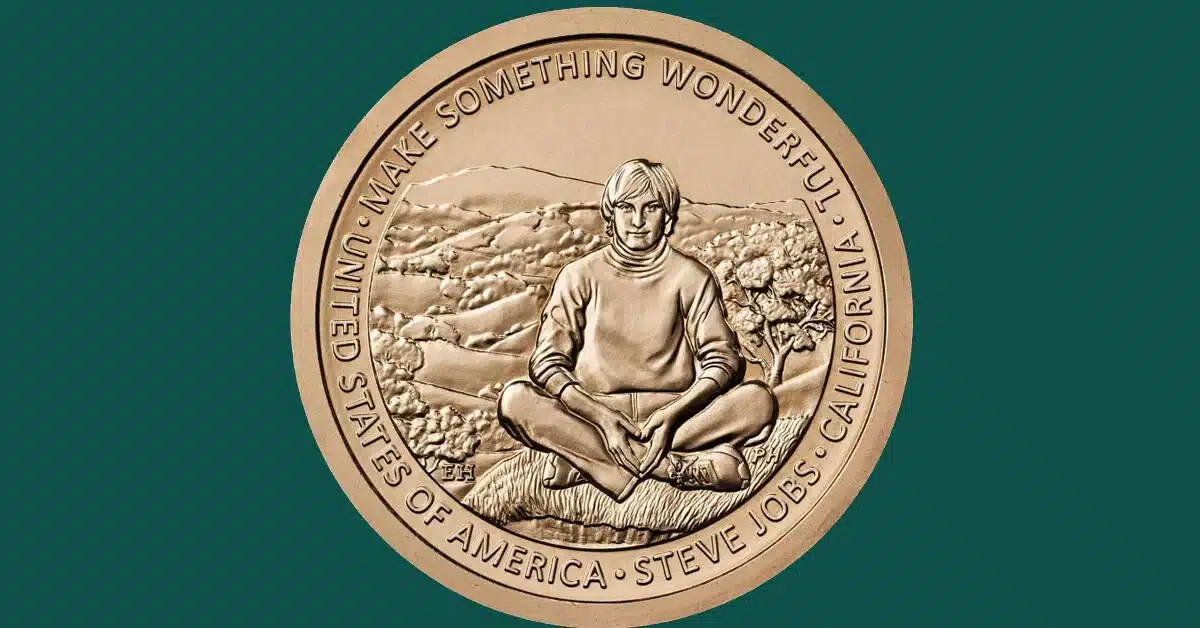 Steve Jobs commemorative coin with engraved portrait design.