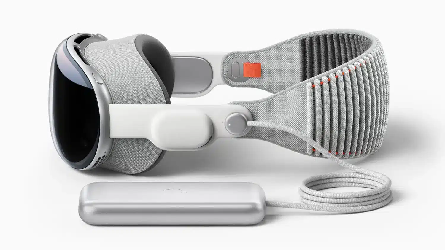 Apple Vision Pro headset with external battery pack and cable.