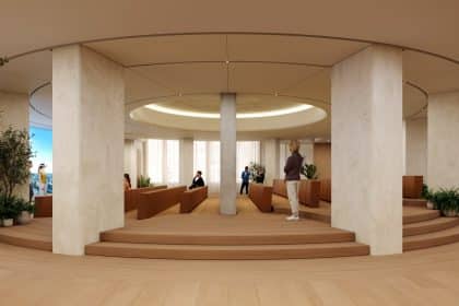 Modern Apple Developer Center auditorium with curved architecture and seating areas.