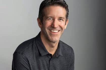 John Ternus smiling in a portrait photo.