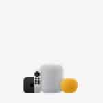 Apple smart home devices, including a HomePod, HomePod mini, Apple TV, and remote control.