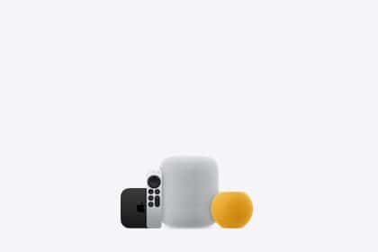 Apple smart home devices, including a HomePod, HomePod mini, Apple TV, and remote control.