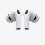 Apple AirPods Pro wireless earbuds with silicone ear tips on a gray background.
