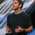 John Ternus speaking during an Apple keynote presentation.