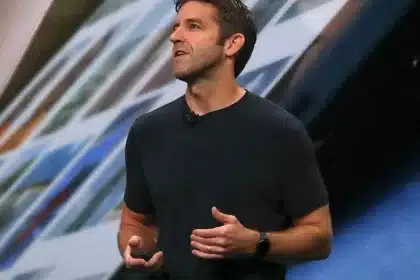 John Ternus speaking during an Apple keynote presentation.