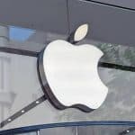 Apple logo displayed outside an Apple Store.