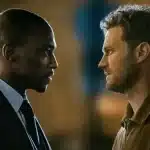 Two men face each other in a tense scene.