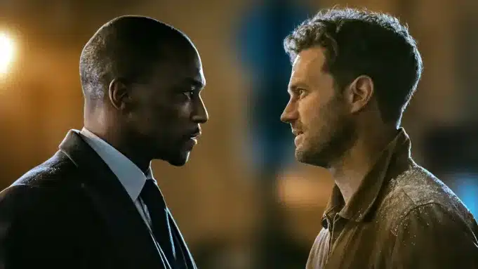 Two men face each other in a tense scene.