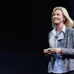 Apple executive Jennifer Bailey speaking on stage.