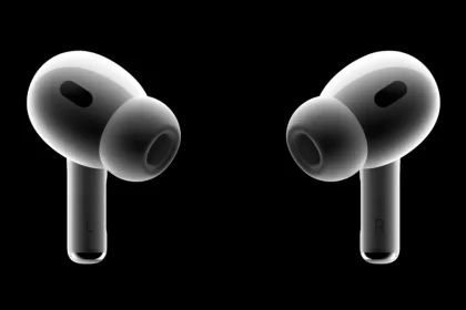 Apple AirPods Pro earbuds on a black background.