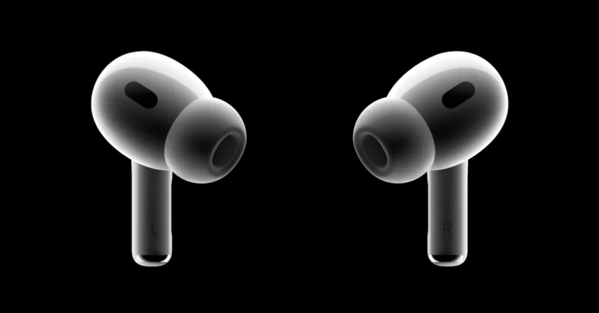 Apple AirPods Pro earbuds on a black background.