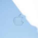 Apple logo displayed on a light blue surface.