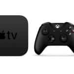 Apple TV device beside a black gaming controller.