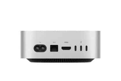 Rear view of a silver Mac mini showing its power, Ethernet, HDMI and Thunderbolt ports.