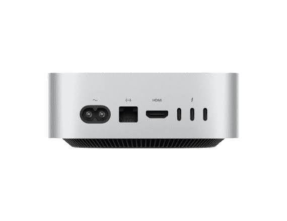 Rear view of a silver Mac mini showing its power, Ethernet, HDMI and Thunderbolt ports.