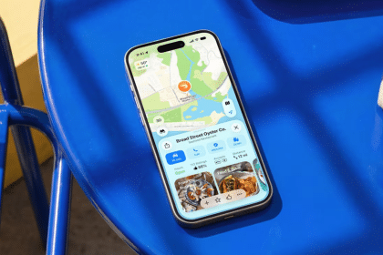 iPhone displaying Apple Maps on a blue chair.