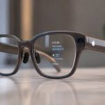 Apple smart glasses with a digital display.