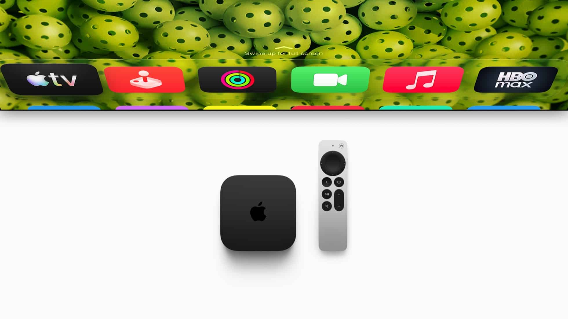 Apple TV 4K streaming device with Siri Remote and app icons displayed on a TV screen.