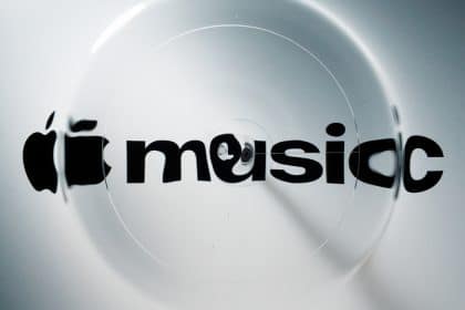 Apple Music logo distorted by circular liquid ripples.