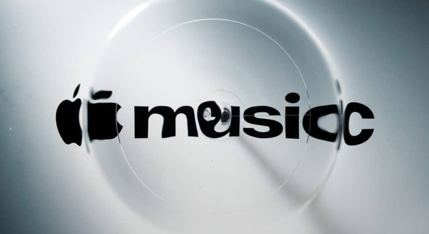 Apple Music logo distorted by circular liquid ripples.