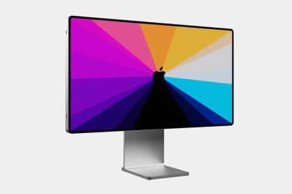 Apple iMac with a colourful display and silver stand.